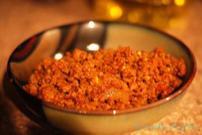...into some of that.  Ground sausage, with minced garlic and salsa.  Use whatever measurements you like.  